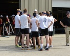 Coach Aaron Marcovy talking to the novice men